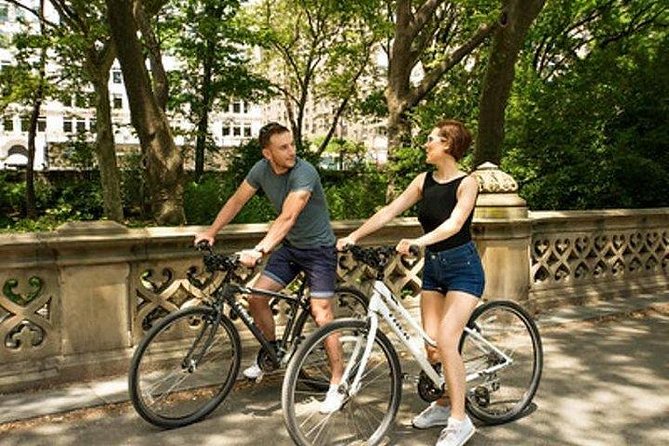Central Park Bike Rental: Quality Bikes with Map, Helmet, Lock - Family riding with baby seats and tag-alongs