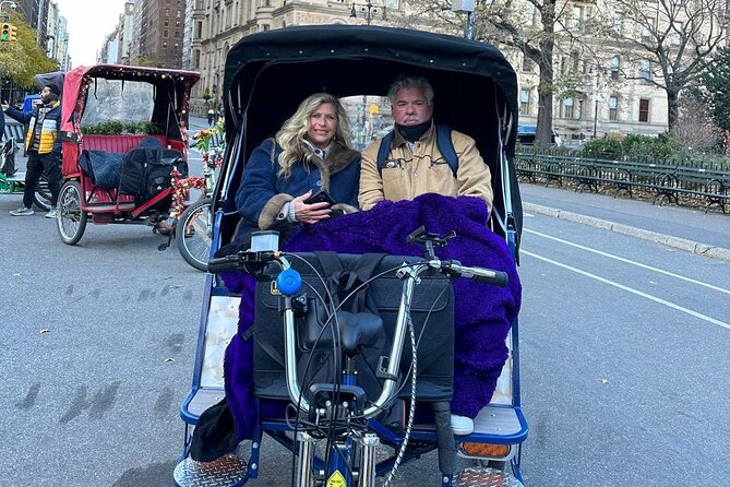 Central Park Pedicab Tour with Guide - Movie locations, a restaurant, open lawns, and a playground