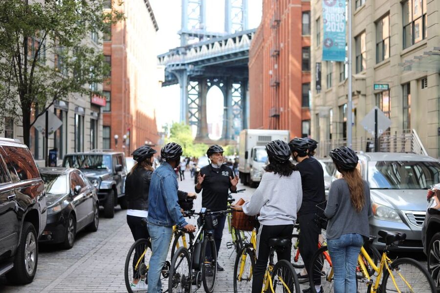 From Manhattan: 2-Hour Brooklyn Bridge Bike Tour - Pace University and the Woolworth Building