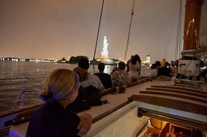 New York City Skyline Night Sailboat Tour - The Statue of Liberty under the lights