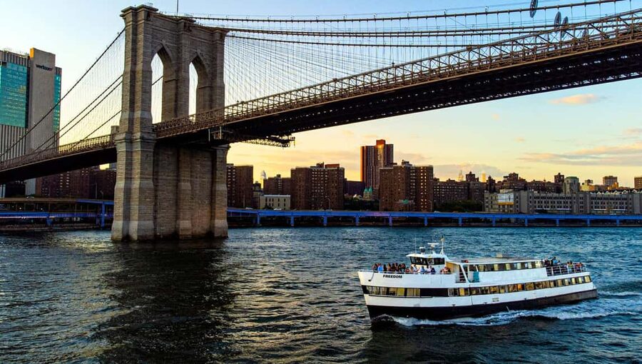 New York: Sunset Cruise with Statue of Liberty Views - Leaving Pier 40 as Manhattan turns gold