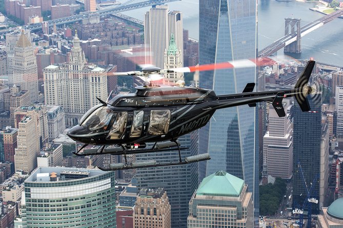 NY Helicopter Tour: Ultimate NYC Sightseeing (Heliport fees Incl) - Bridges and buildings on the city’s eastern side