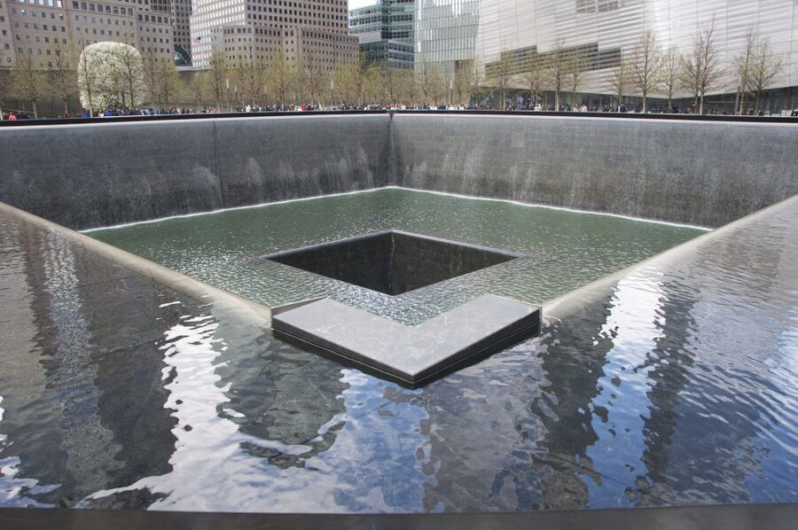 NYC: 9/11 Memorial and Financial District Walking Tour - Paying respects at the Firefighters Memorial