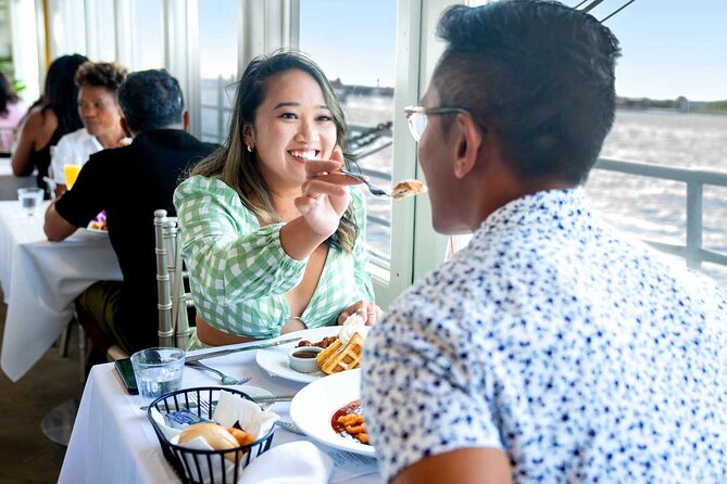 NYC Bottomless Brunch Cruise with Iconic Views - The Statue of Liberty and Ellis Island from the water