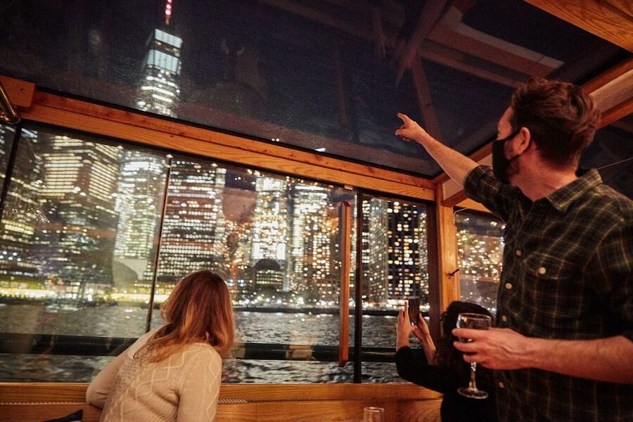 NYC: City Lights Yacht Cruise with Drink Included - The indoor salon, open decks, and best viewing spots