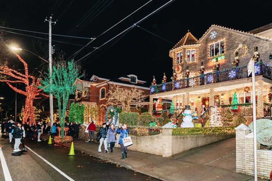 NYC: Dyker Heights Christmas Lights & Skyline View Bus Tour - The East River ride back to Midtown