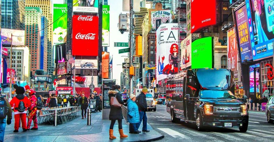 NYC: Guided Bus and Walking Tour with Staten Island Ferry - Rockefeller Center brings the postcard views