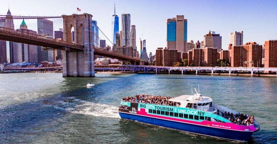 NYC: Manhattan & Statue of Liberty Cruise with Shuttle Bus - Sailing beneath Brooklyn Bridge