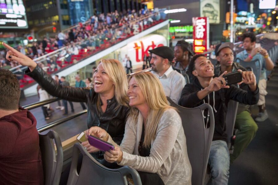 NYC: Sightseeing Night Tour by Open-Top Bus with Live Guide - Open-top comfort, weather, and low branches