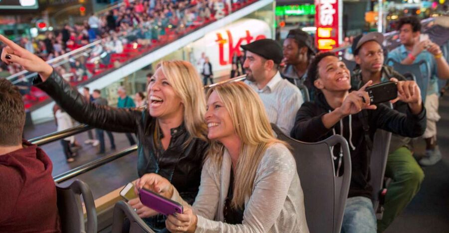 NYC: Sightseeing Night Tour by Open-Top Bus with Live Guide - Price, included drink, and photo option