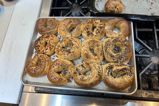 NYC: Upper West Side Hands-On Bagel Baking Class - Eating fresh bagels with cream cheese and smoked fish