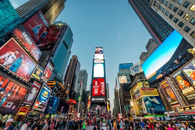 Skyline Night Bus Audio Narrated Tour Experience - Rockefeller Center and Radio City bring classic New York style