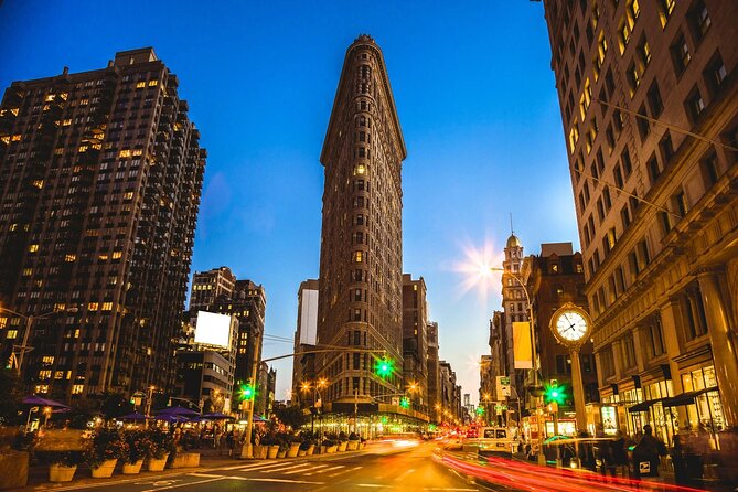 Skyline Night Bus Audio Narrated Tour Experience - Lower Manhattan glows around Wall Street and the harbor