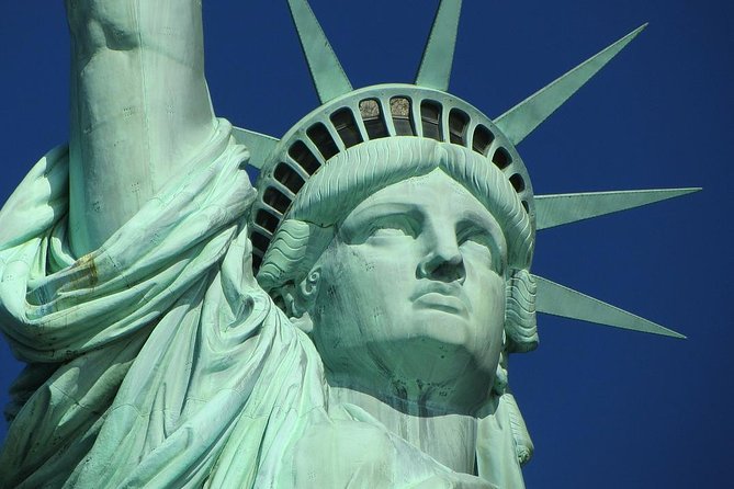Statue of Liberty, Ellis Island, and 9/11 Memorial Guided Tour - Starting at Battery Park and Castle Clinton